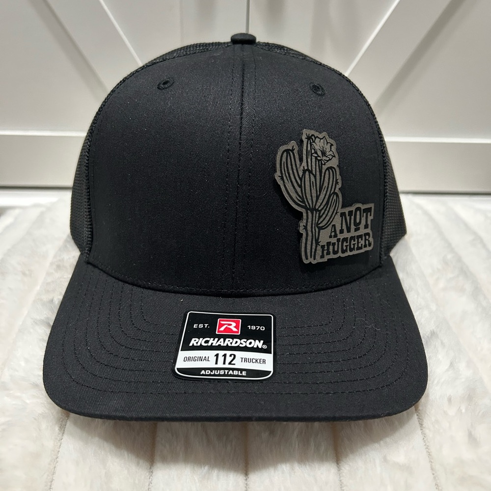 Not a hugger Laser engraved Richardson Trucker hat.